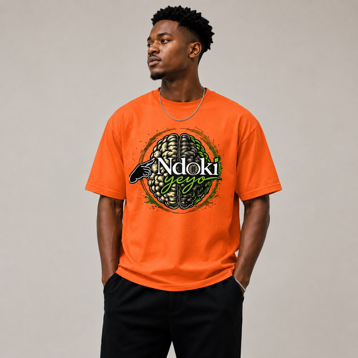 Ndoki Yeyo orange shirt studio look
